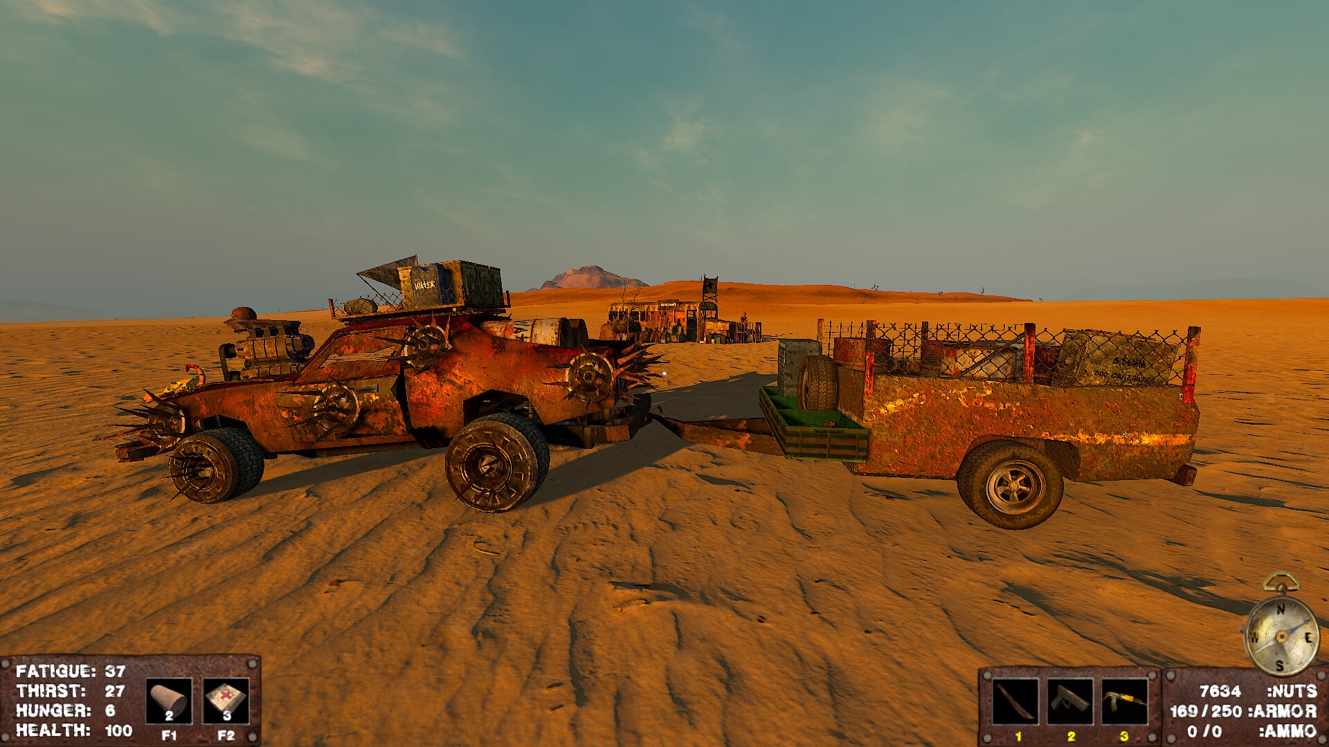 Una pickup blindada con parrilla de metal jala un remolque de carga en un campamento del desierto.